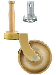 Large Brass Grip-Neck Caster with 1 1/2 inch Brass Wheel.
